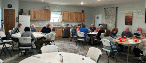 Enjoying a pot luck dinner with friends at the community 