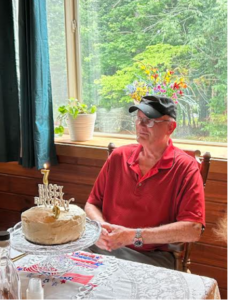 Mike Foote enjoying birthday cake.