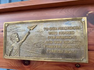Plaque states "To hour neighbors who shared our horizons and our hearts, forever soaring, forever home."